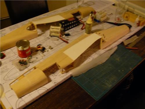 http://forums.modelflying.co.uk/sites/3/images/member_albums/28963/24_sheeting_finished__remembered_to_leave_access_holes_for_final_assy.JPG