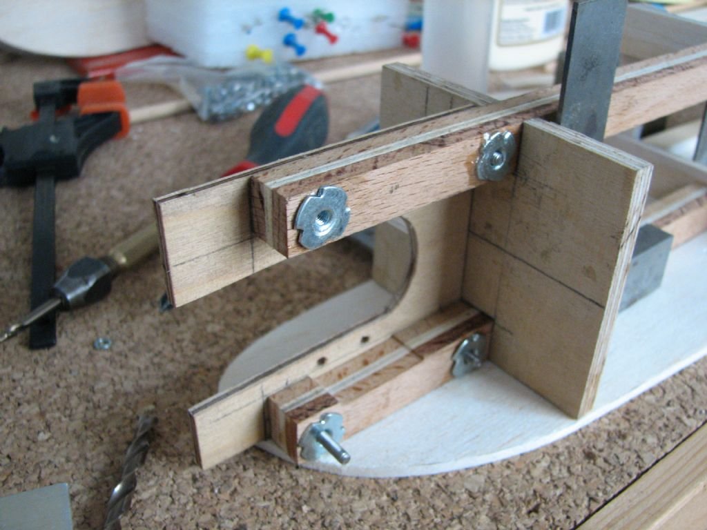 Using blind nuts and 3mm bolts instead of wood screws shown on the